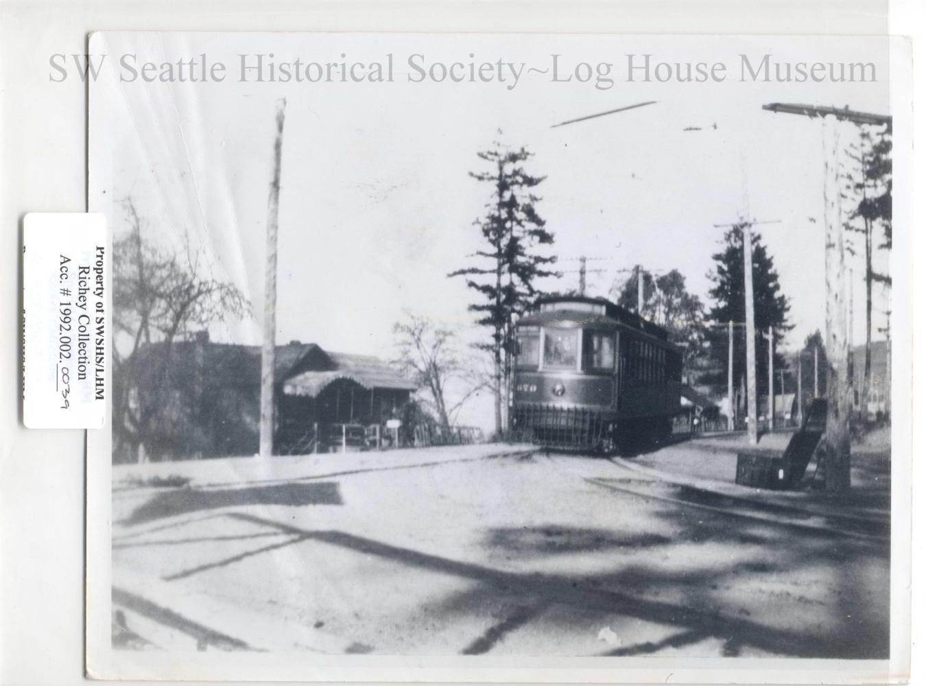 Intersection of Alki Avenue and 63rd Ave SW, as the streetcar passes. SWSHS #1992.2.39